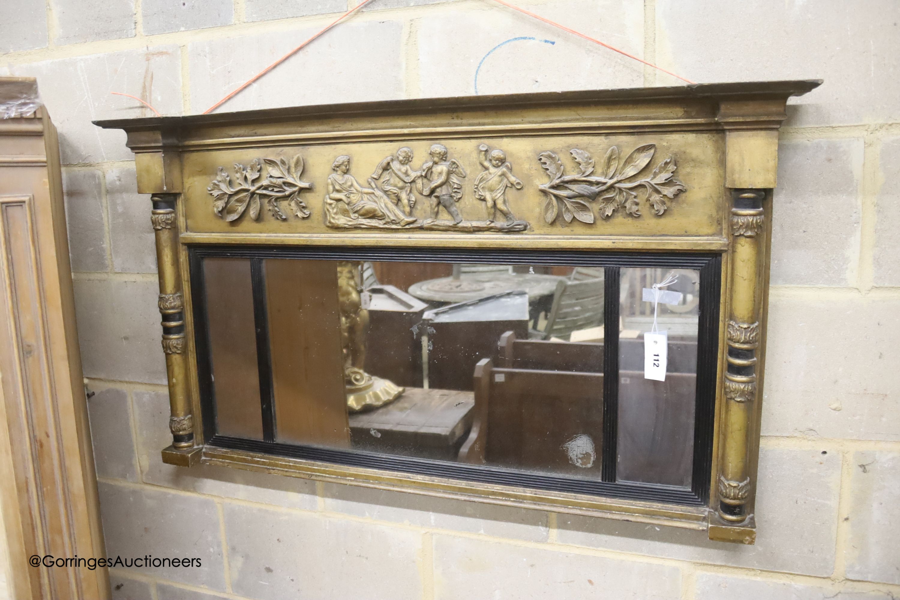 A 19th century giltwood landscape overmantel mirror, with moulded classical figures to the frieze, flanked by pilasters, width 116cm height 66cm